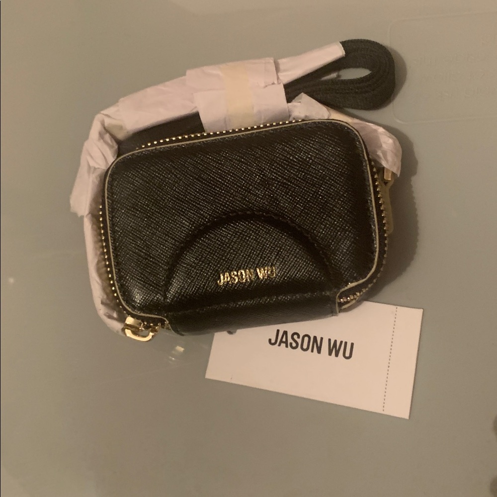 Jason Wu Black Mini Bag with Gold Details.